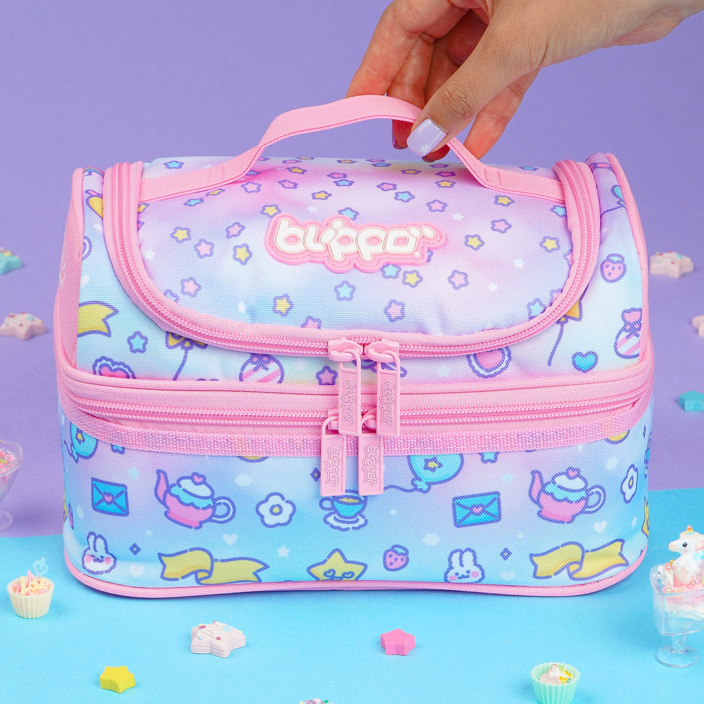 Woman holding a cute pink insulated lunch box designed for girls and featuring kawaii designs for school.